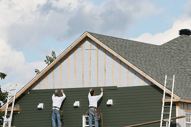 Professional Siding Replacement technician working in Babson Park, MA